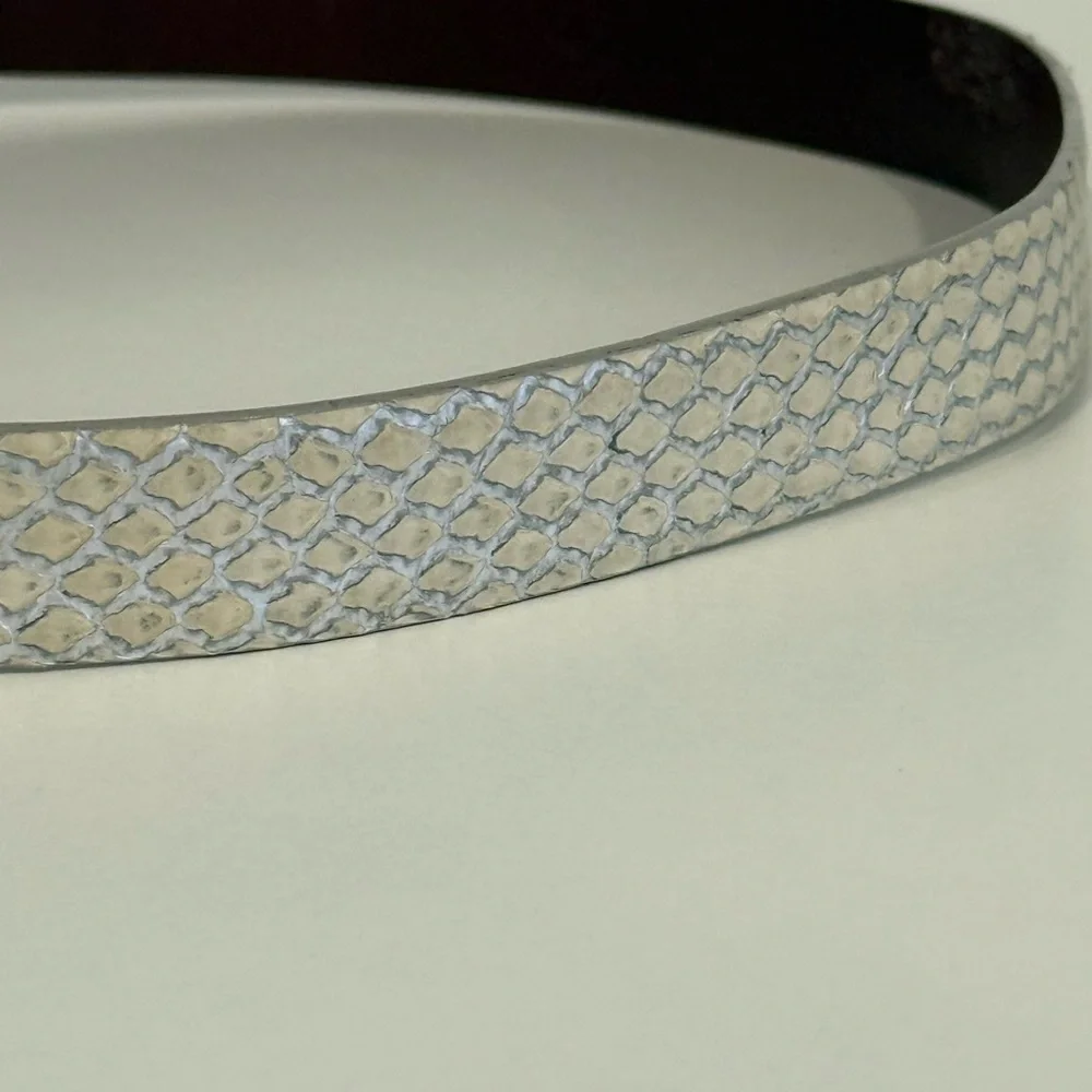 Calvin Klein Vintage 90's silver and ivory python leather belt made in Italy
